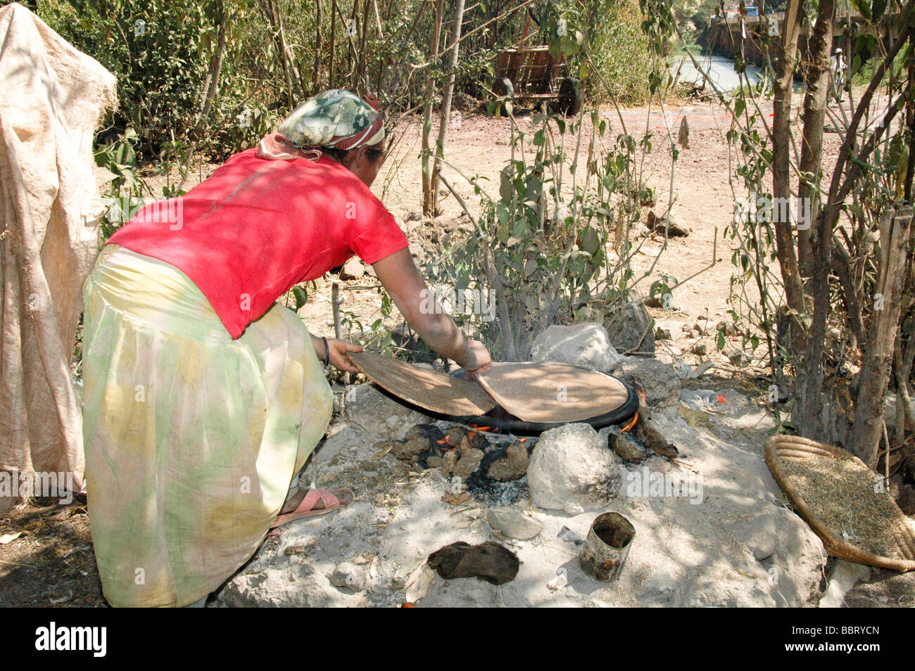 Africa Ethiopia Lalibela Woman cooking Injera pancake like bread Stock