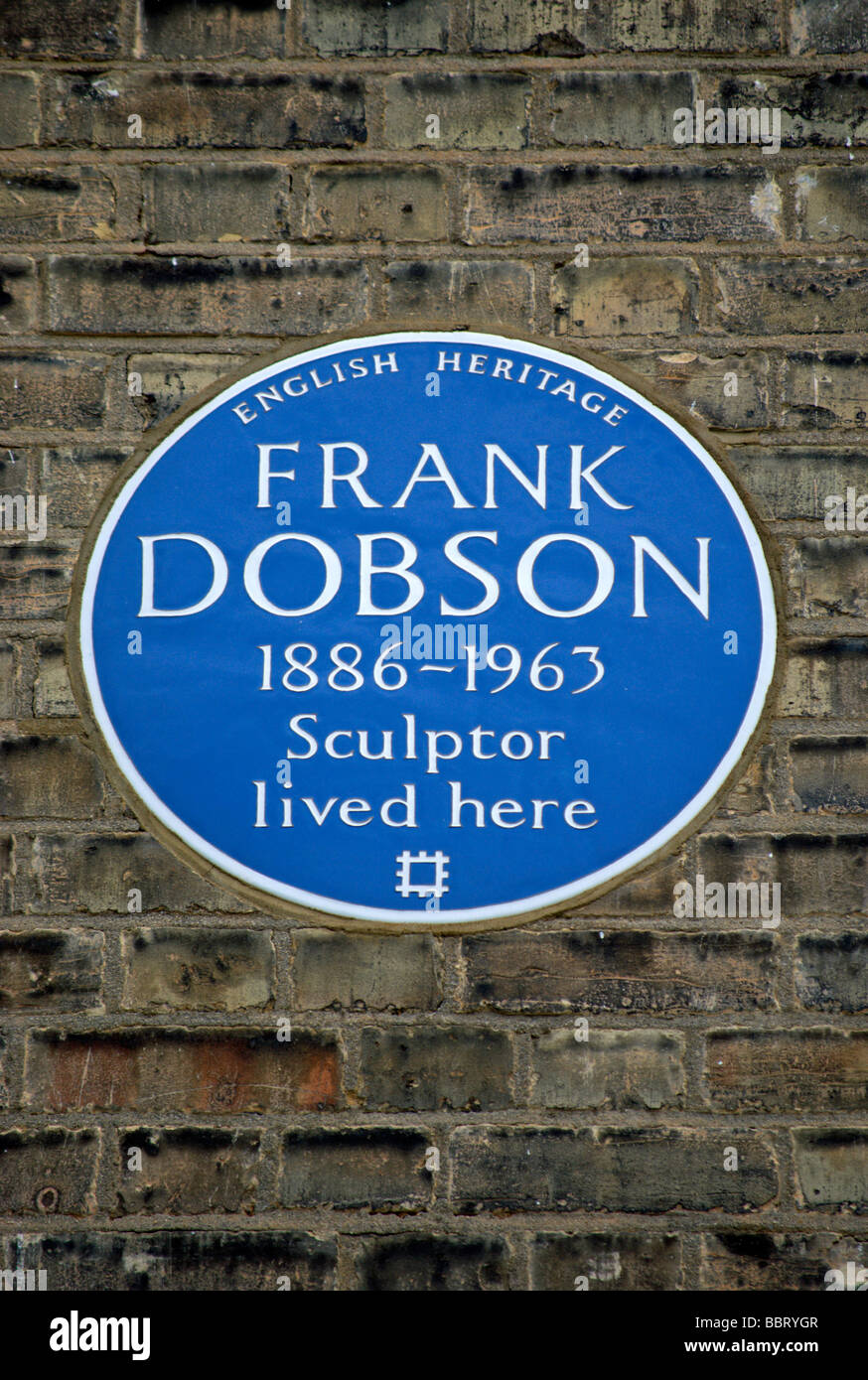 english heritage blue plaque marking a former home of sculptir frank dobson, in kensington, london, england Stock Photo