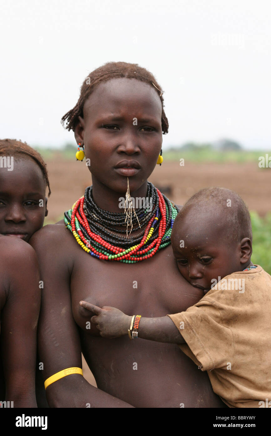 Africa Ethiopia Omo Valley Daasanach tribe woman and baby Stock Photo