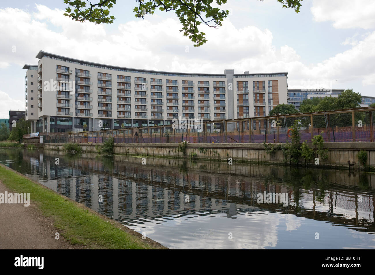 2012 Olympics site, nearby Modern apartments overlooking Regents Canal East Tower Hamlets London GB UK Stock Photo