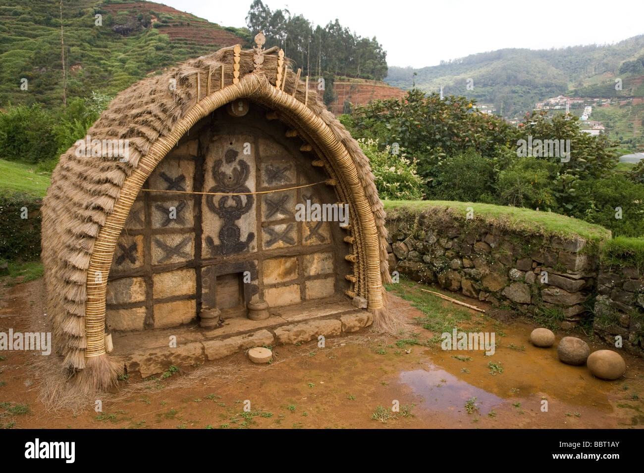 The temple in a Toda tribal mund (settlement). The mund is within the Botanical Garden at the Indian hillstation of Ooty. Stock Photo