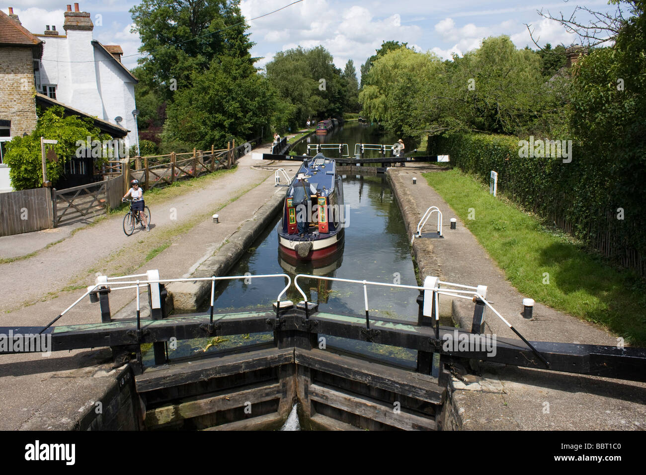 Lock gates and barge, Grand union canal, colne valley trail south bucks england uk gb Stock Photo