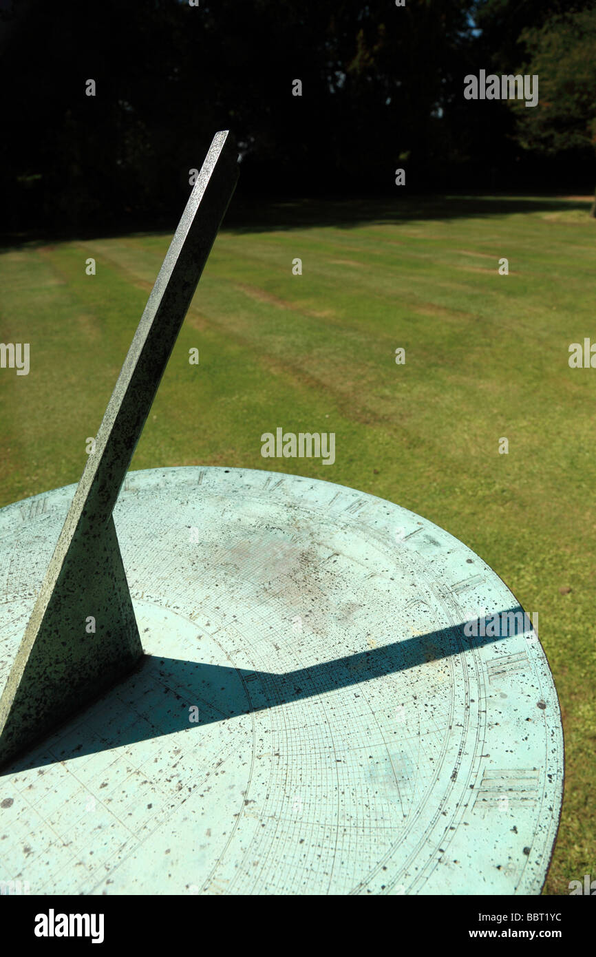 Sundial with clear shadow showing the time Stock Photo Alamy