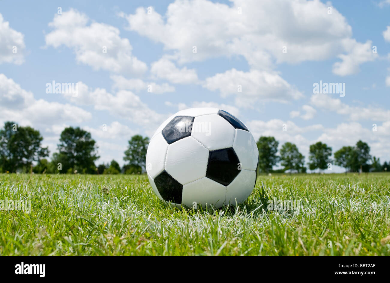 Soccer ball in corner pitch area Stock Photo Alamy