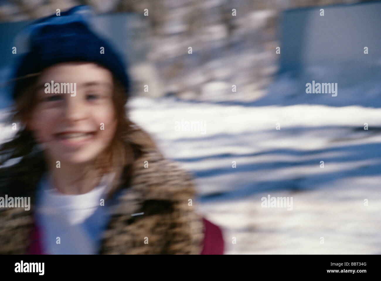 Young Girl Running in the Snow Motion Blur Stock Photo Alamy