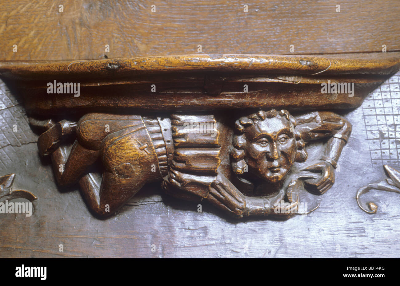 Medieval Misericord Christchurch Priory Hampshire England UK woodwork woodcarving figure Stock Photo