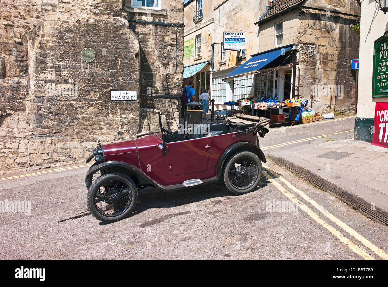 Old Austin Seven tourer car parked in The Shambles in 'Bradford on Avon' Wiltshire UK Stock Photo