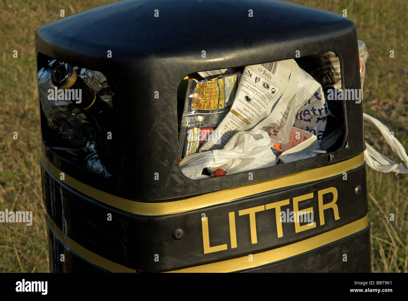 Full litter bin Stock Photo Alamy