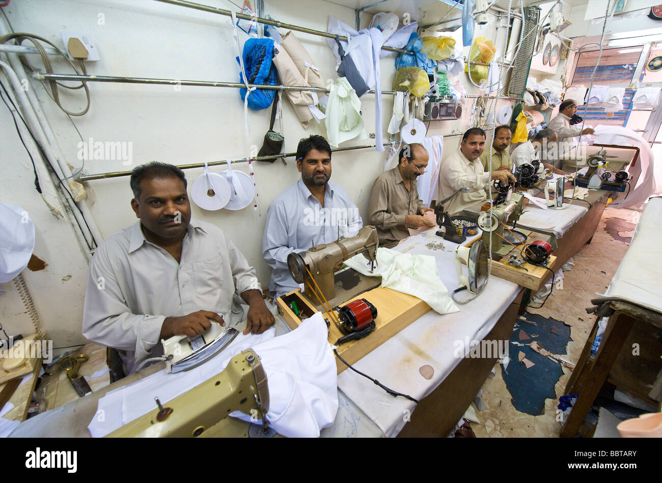 Dubai a Indian sewing shop in the old Arab town Stock Photo Alamy