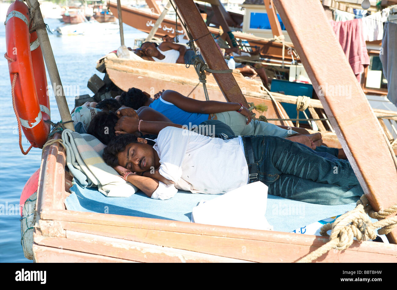 Dubai local fishermen sleeping on their ship Stock Photo