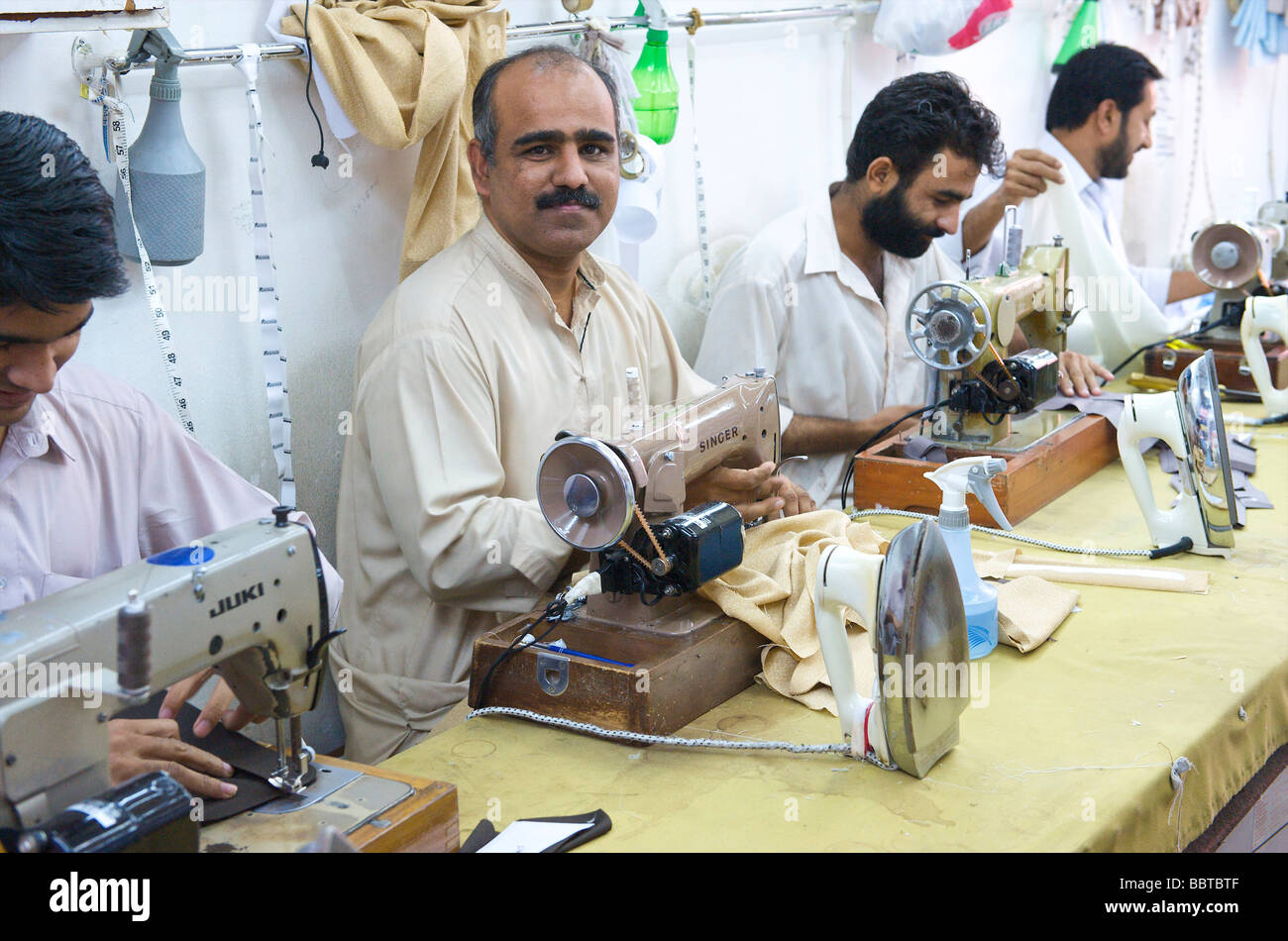Indian man old sewing machine hires stock photography and images Alamy
