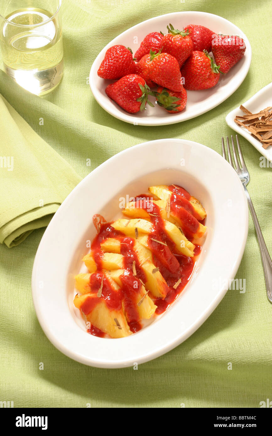 Ananas in strawberry juice, Italy Stock Photo Alamy