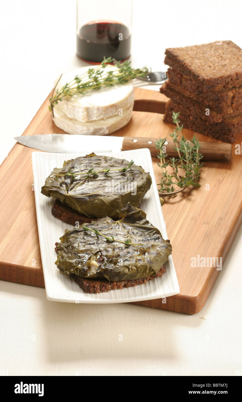 Goat cheese in vine leaves hires stock photography and images Alamy