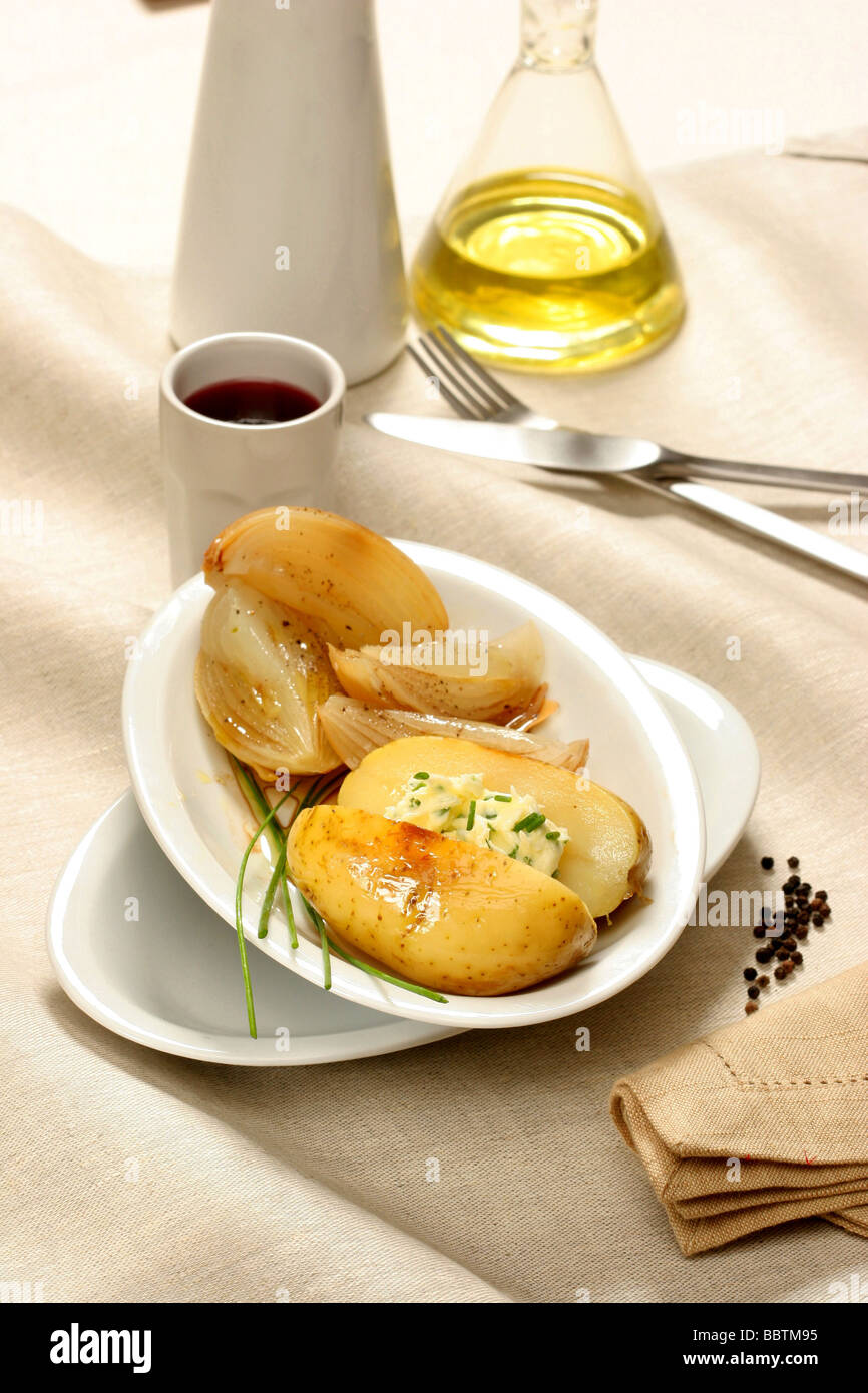 Potatoes and onion cooked in dust, Italy Stock Photo Alamy