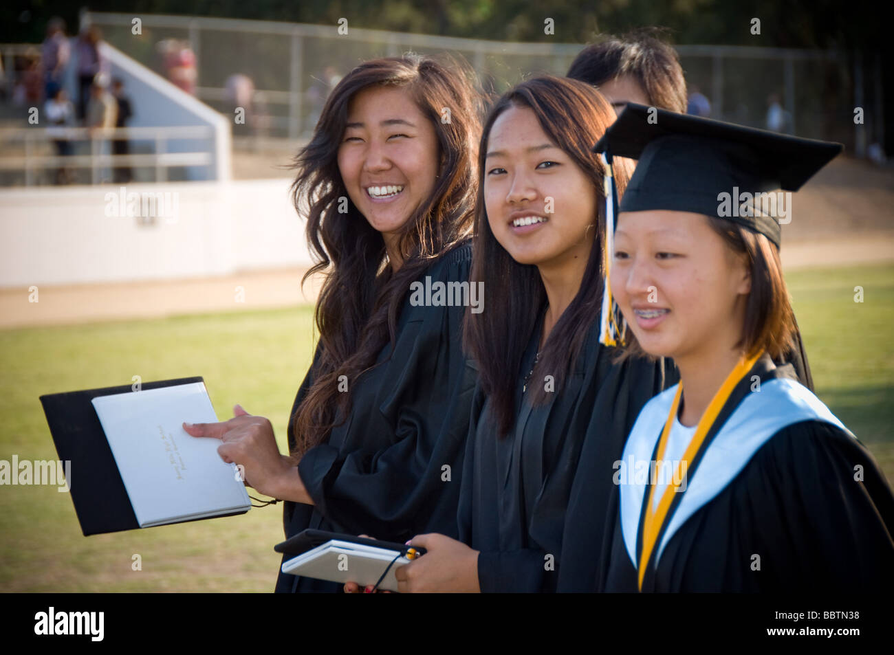 high school graduation grad asian american teenager teen Stock Photo