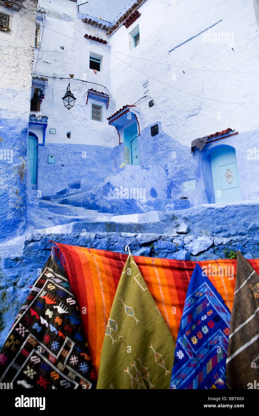 Rugs Hanging on a wall, Chefchaouen, Morocco, North Africa Stock Photo