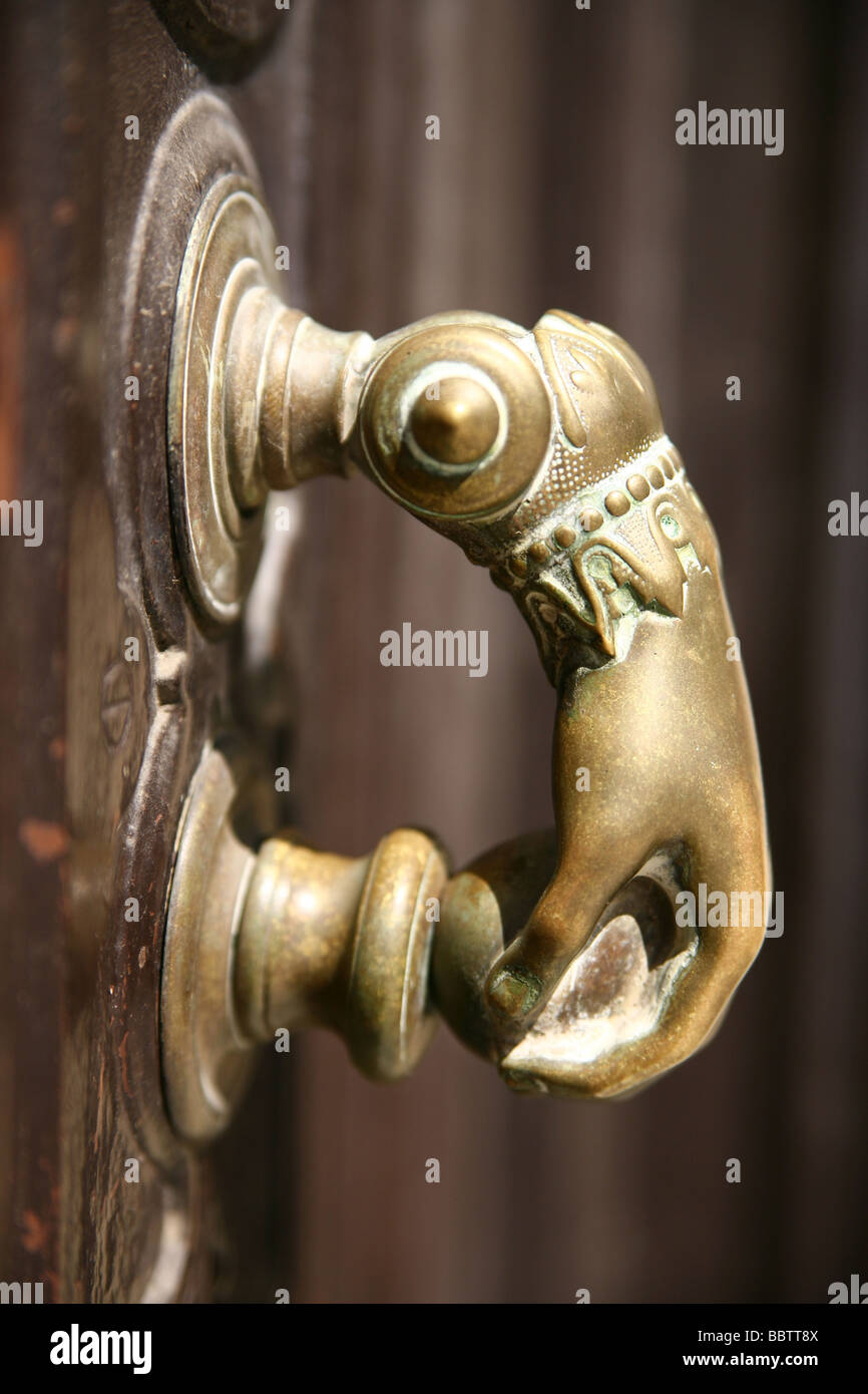 Brass ball in hand door knocker hi-res stock photography and images - Alamy