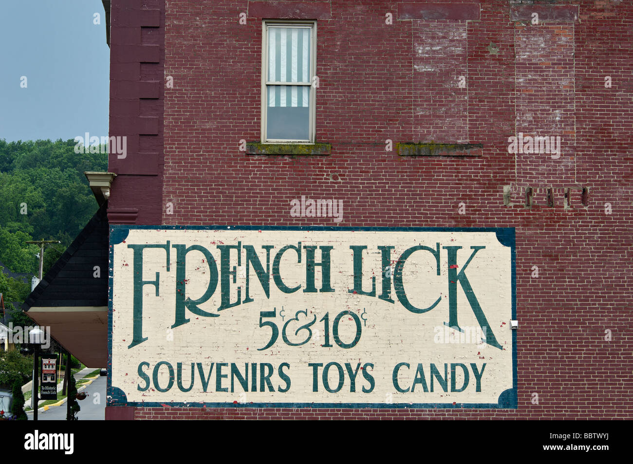 Painted Sign on Side of Brick Building in French Lick Indiana Stock Photo