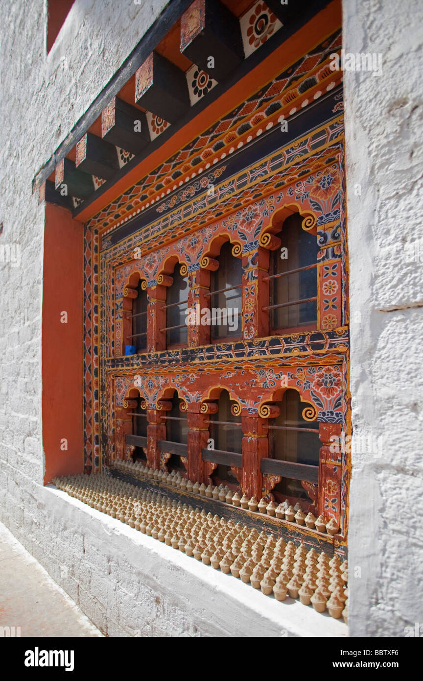 Details of window and statuettes at National Library of Bhutan building Tashi Chho Dzong  Thimphu Stock Photo