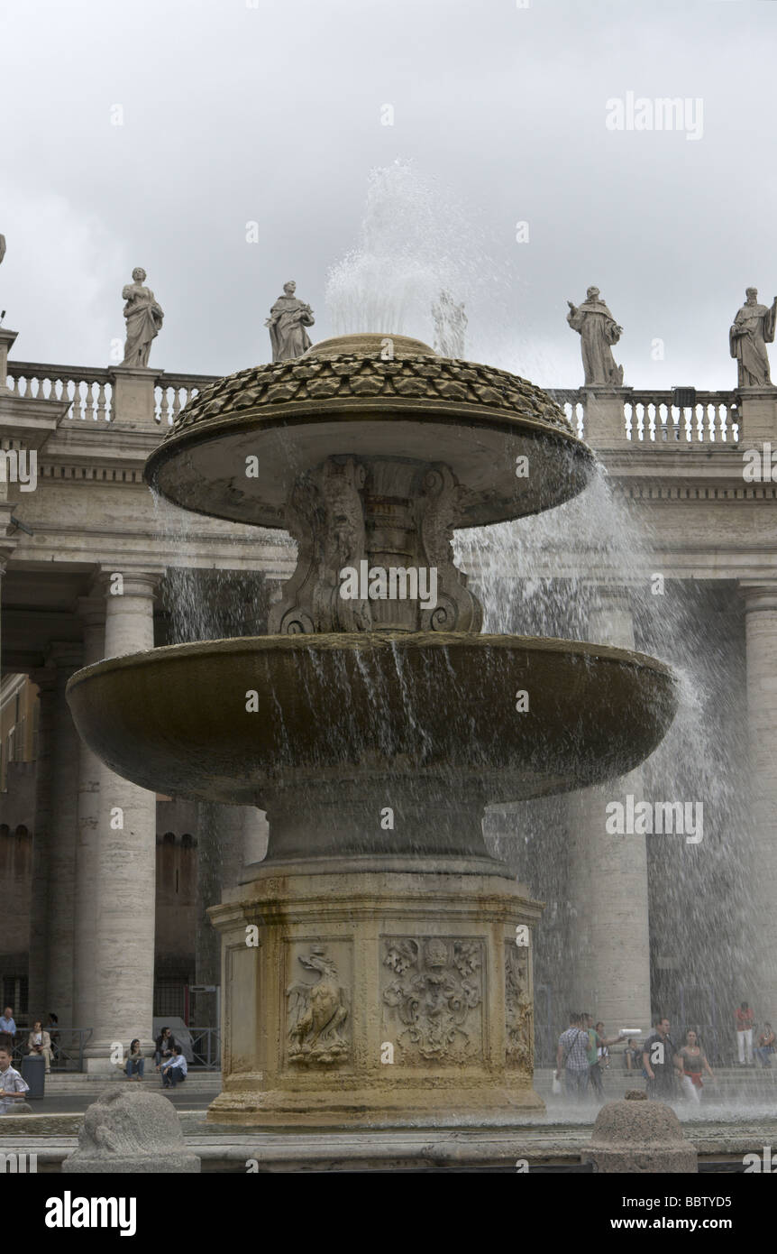 View of the northern fountain in Piazza San Pietro, Rome, with Bernini's colonnade on the background Stock Photo