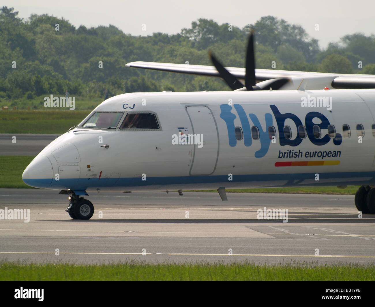 Nose and cockpit Flybe Dehavilland Dash after landing at Manchester airport Stock Photo
