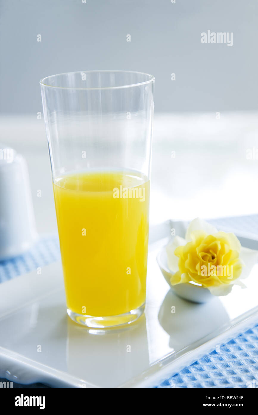 Lemon juice and yellow rose Stock Photo Alamy