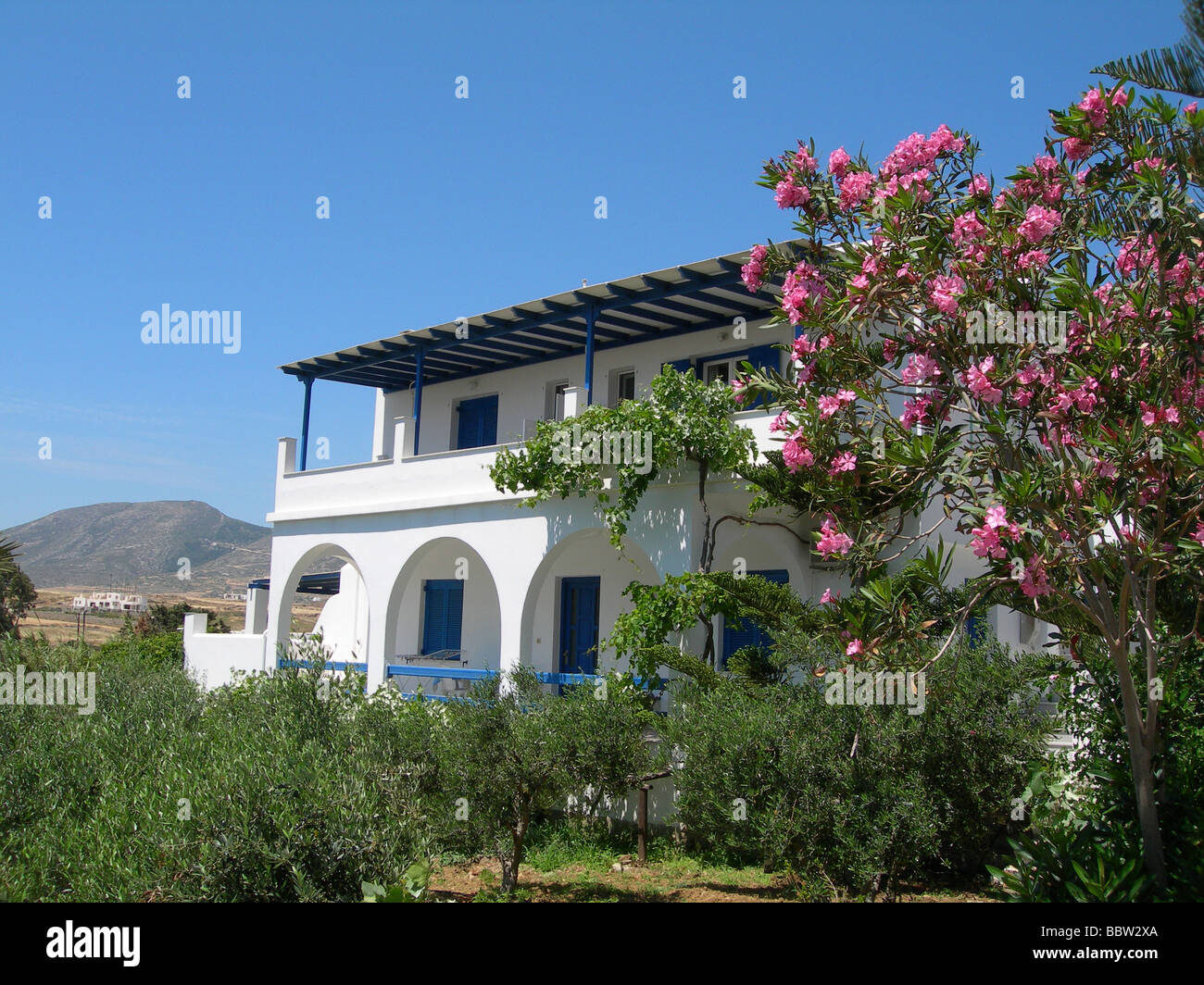 greece greek islands architecture cyclades greek island whitewashed building construction generic blue shutters stucco white flo Stock Photo