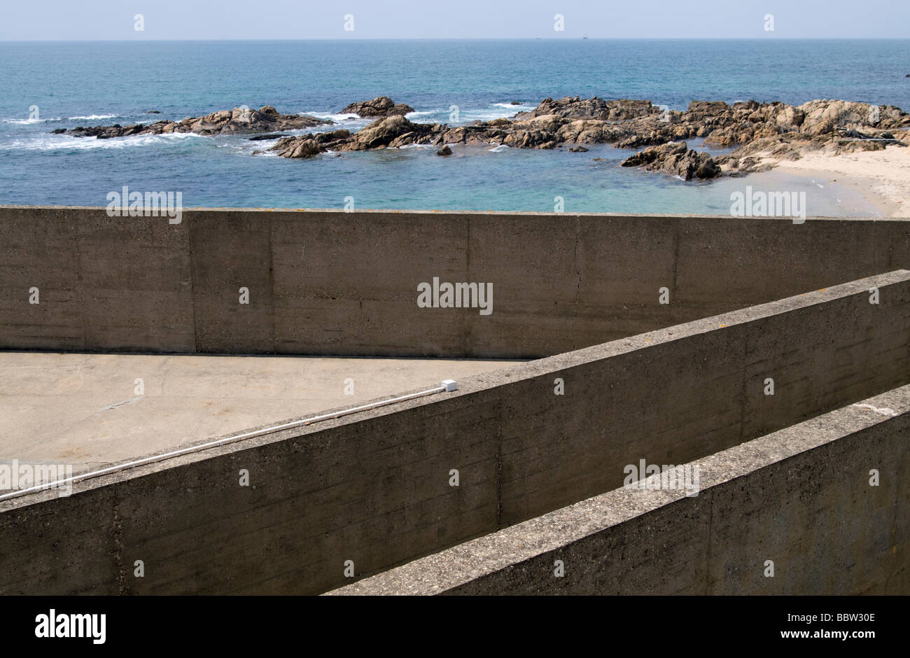 Swimming pool in Leça da Palmeira beach projected by Alvaro Siza Vieira Stock Photo