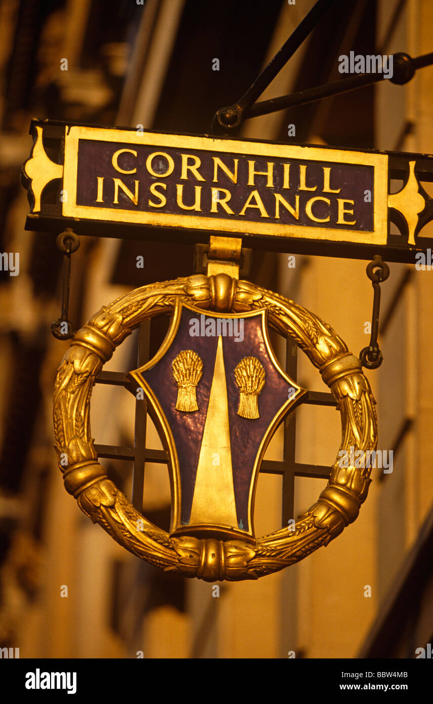 Early sun on the guilded Cornhill Insurance crest sign in City of London Stock Photo