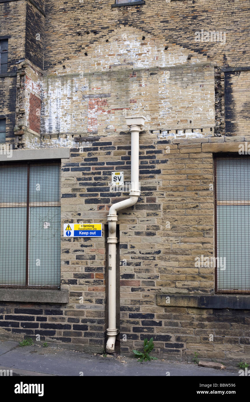 Soon-to-be demolished industrial warehouse buildings making way for new apartments near Bradford city centre. Stock Photo