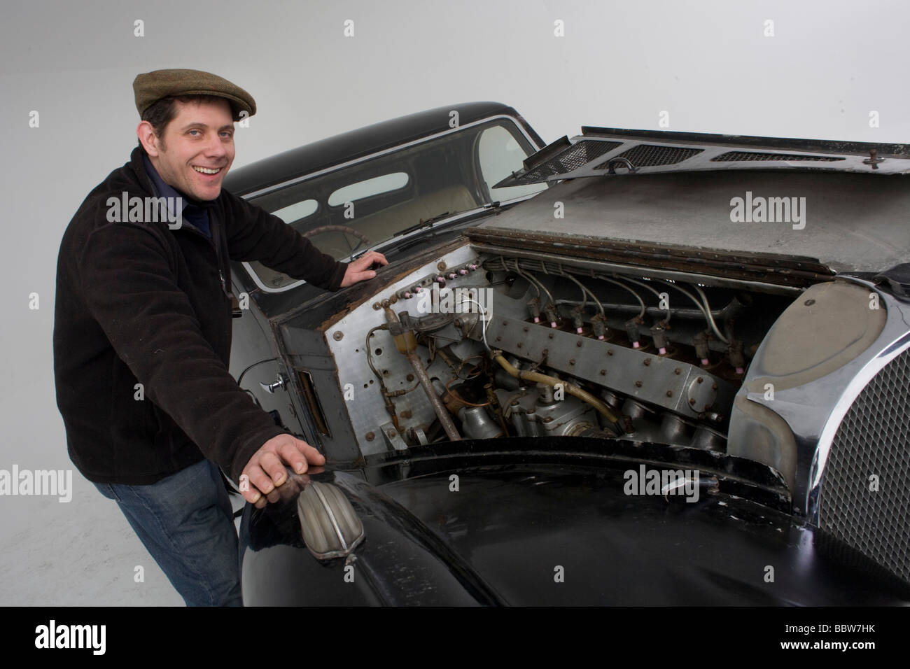 Classic car restorer Nick Benwell and open bonnet of a 1937 Bugatti ...