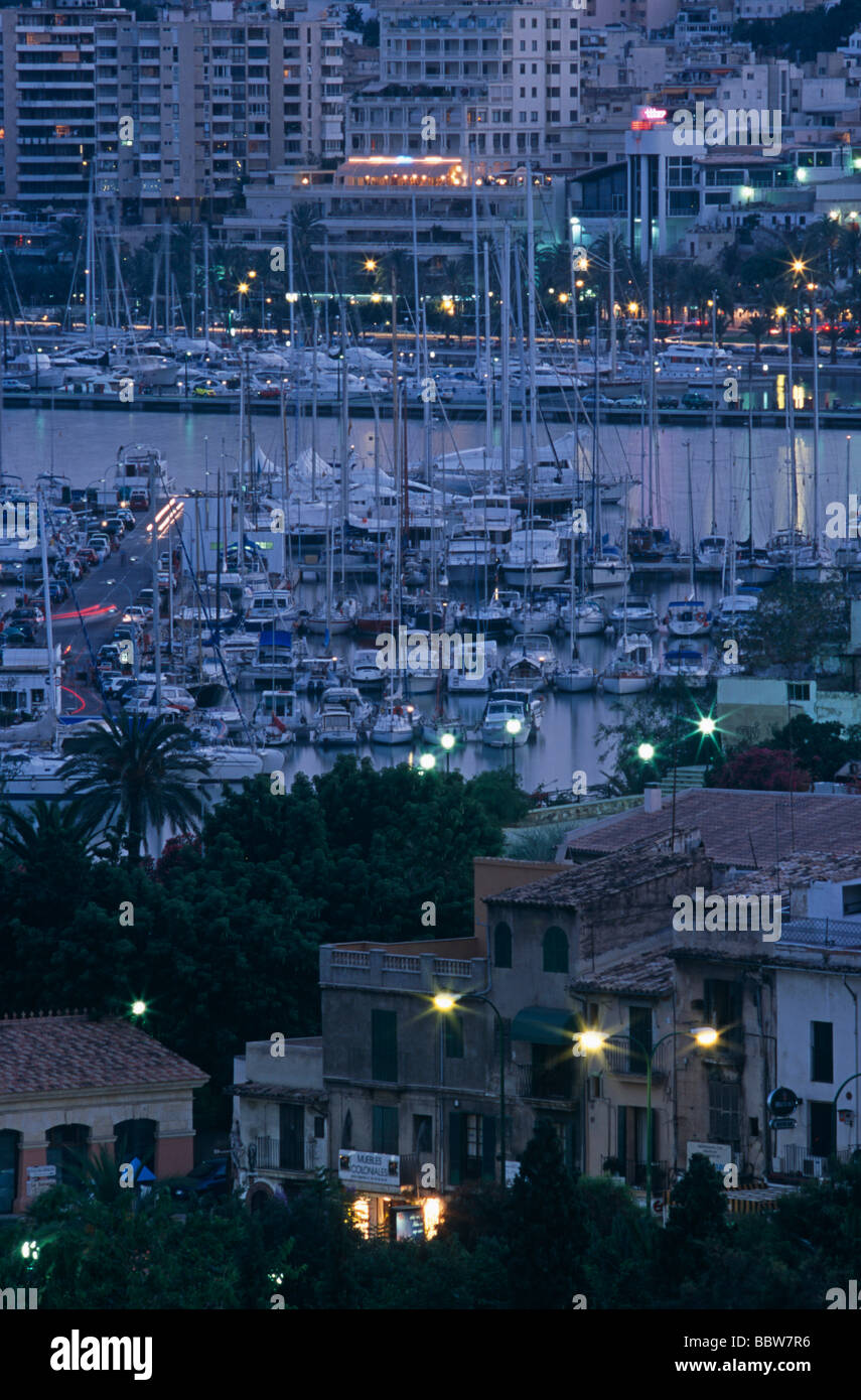 Boating and nightlife of the Passeo Maritime and harbour seen at dusk from Palma's Catalina area. Stock Photo