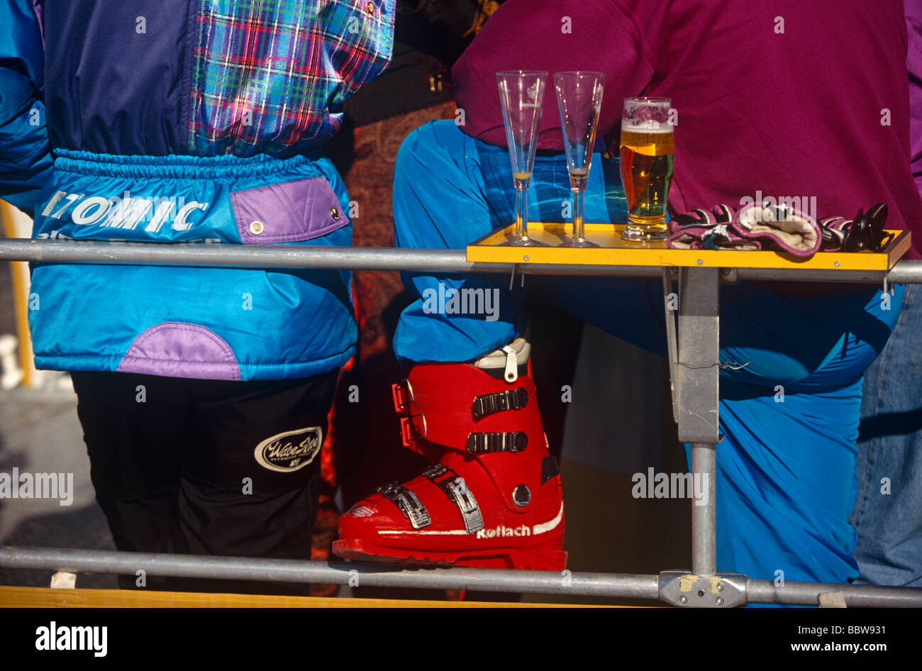 Near-empty glasses belonging to anonymous skiiers, stopped for mountaintop alcoholic drinks before plummeting downhill Stock Photo