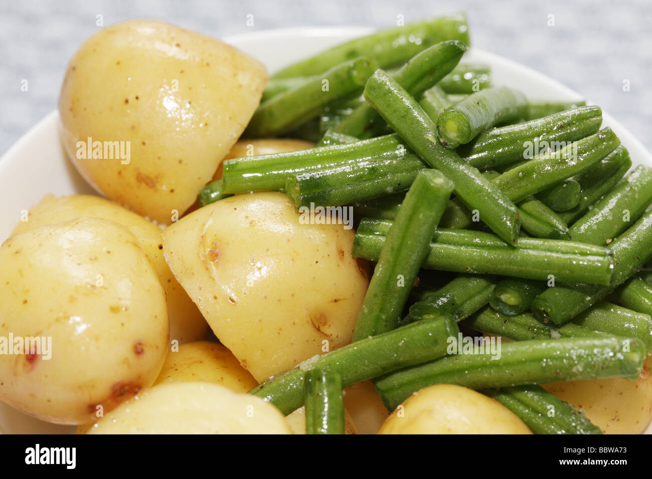 Bowl of Boiled Potatoes and Green Beans Stock Photo Alamy