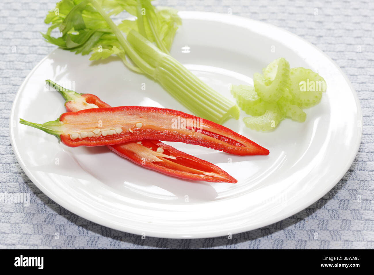 Red Chilli with Celery Stock Photo Alamy