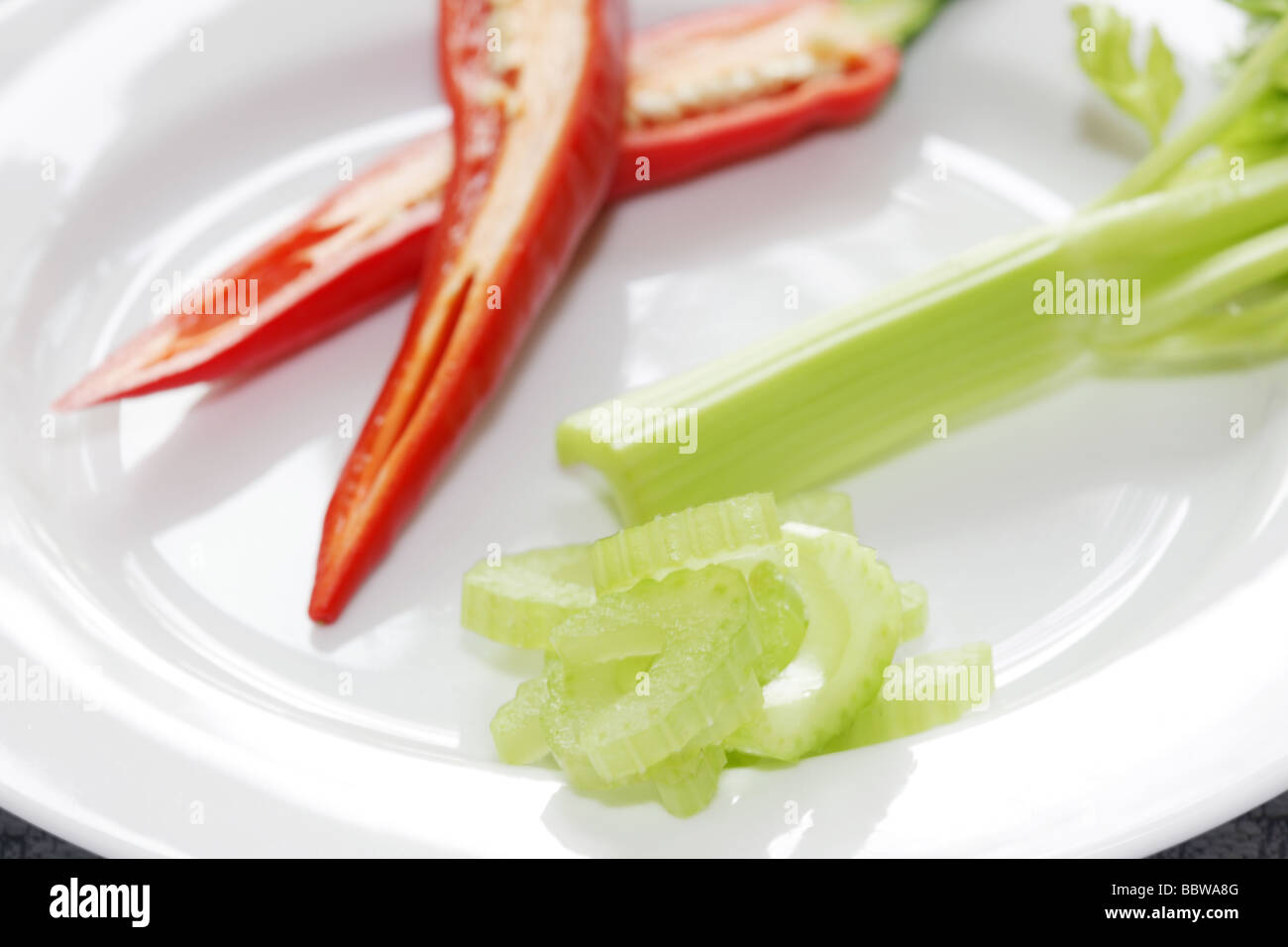 Red Chilli with Celery Stock Photo Alamy