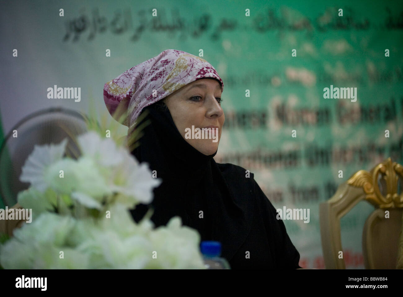 British Muslim activist, TV broadcaster and journalist, Yvonne Ridley listens to speeches by women of Darfur in  Al-Fashir Stock Photo