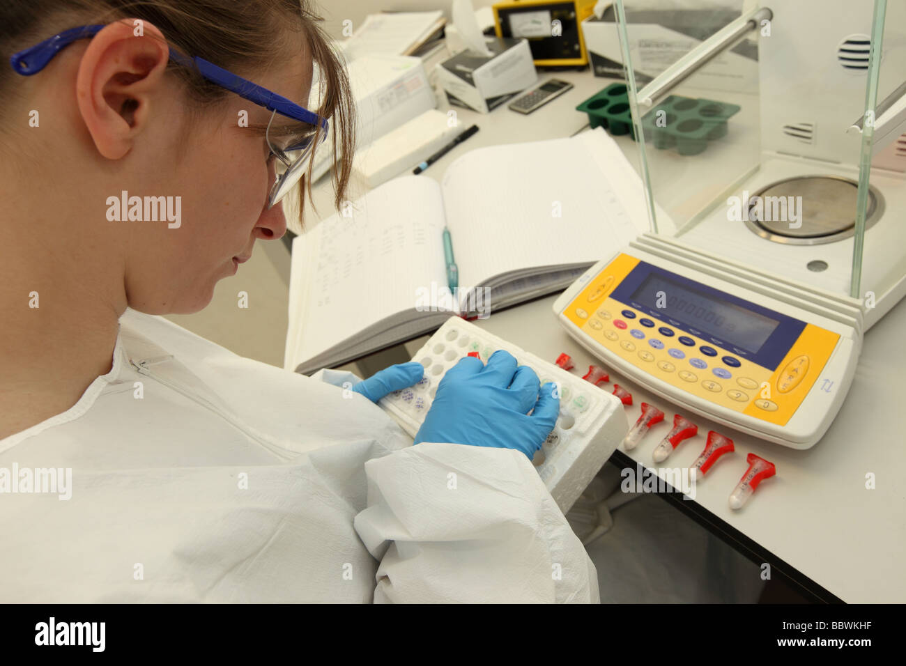 Scientist works in a Weighing Room of a Clean Laboratory on Climate Change Research. Stock Photo