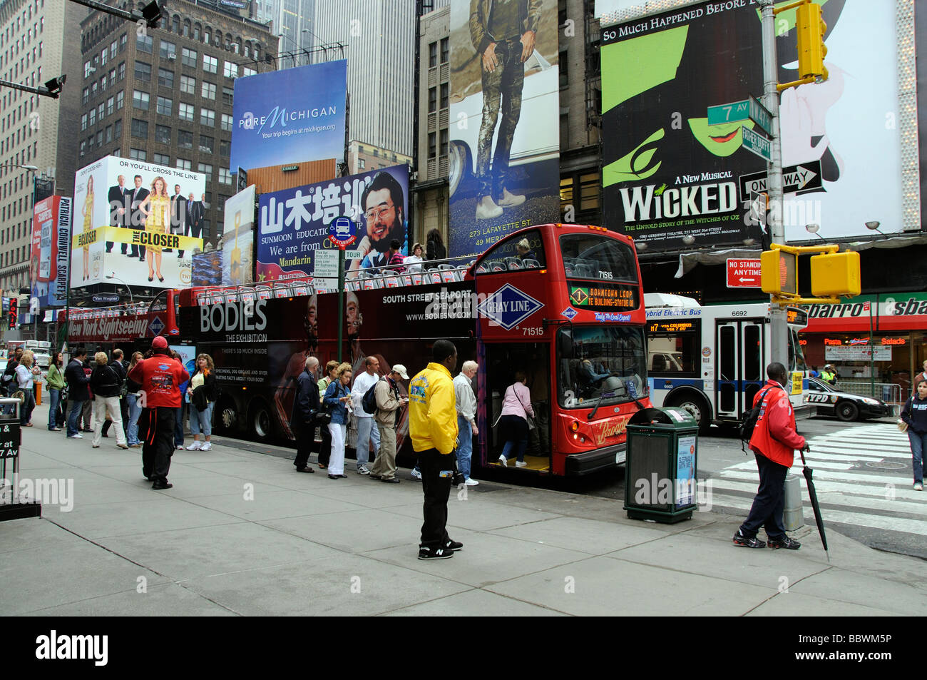 New York sightseeing bus sightseers tourists boarding for a trip round