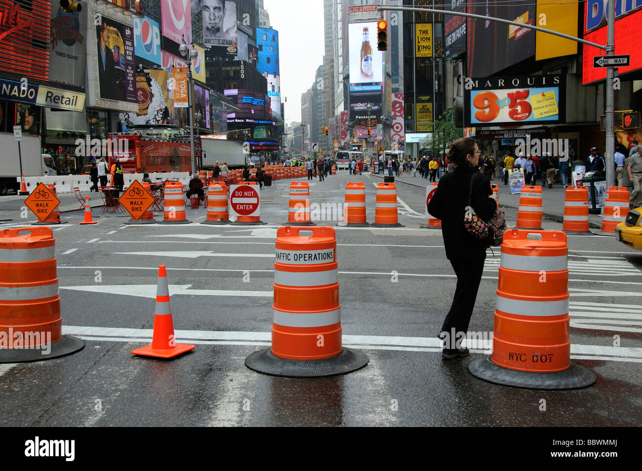 Traffic cones form a pedestrian mall at road closure on Broadway at