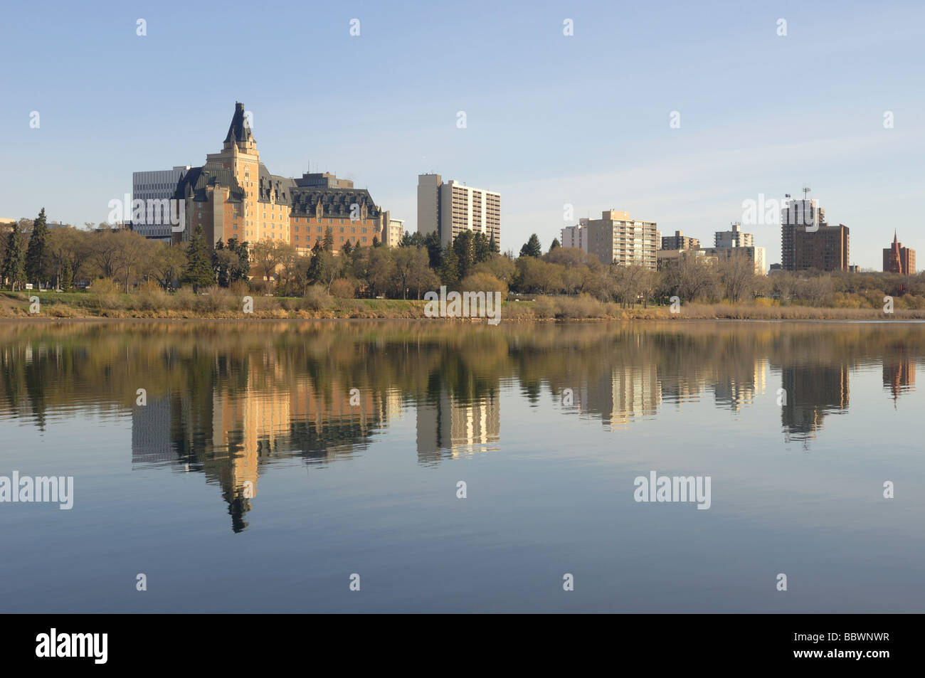Saskatoon The Saskatoon skyline with the iconic Bessborough Hotel reflected in the South Saskatchewan River Stock Photo