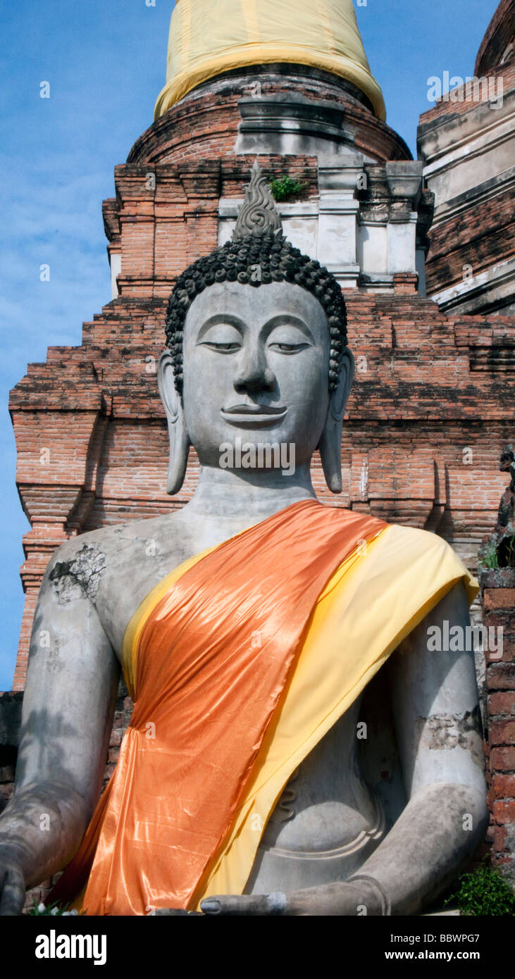 Buddha statue yellow robes Wat Yai Chai Mongkhon Ayutthaya Thailand Stock Photo
