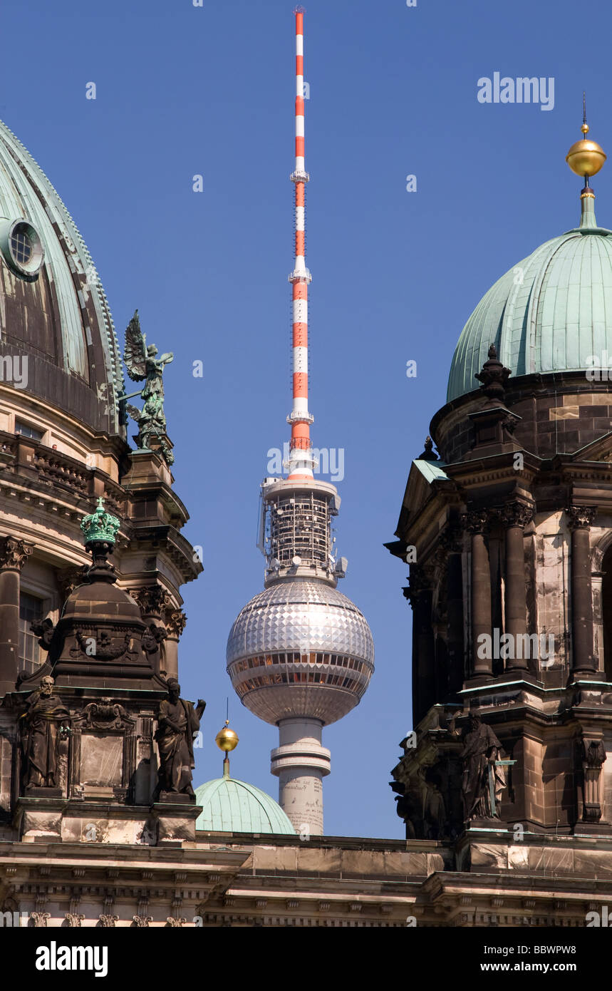 The Fernsehturm (TV Tower) as seen through the domes of the Berlin Cathedral Stock Photo