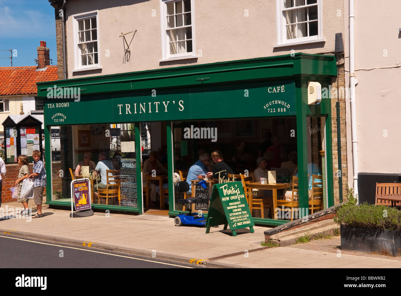 Trinity's tea Rooms cafe coffee shop store in Southwold in Suffolk Uk with customers inside Stock Photo