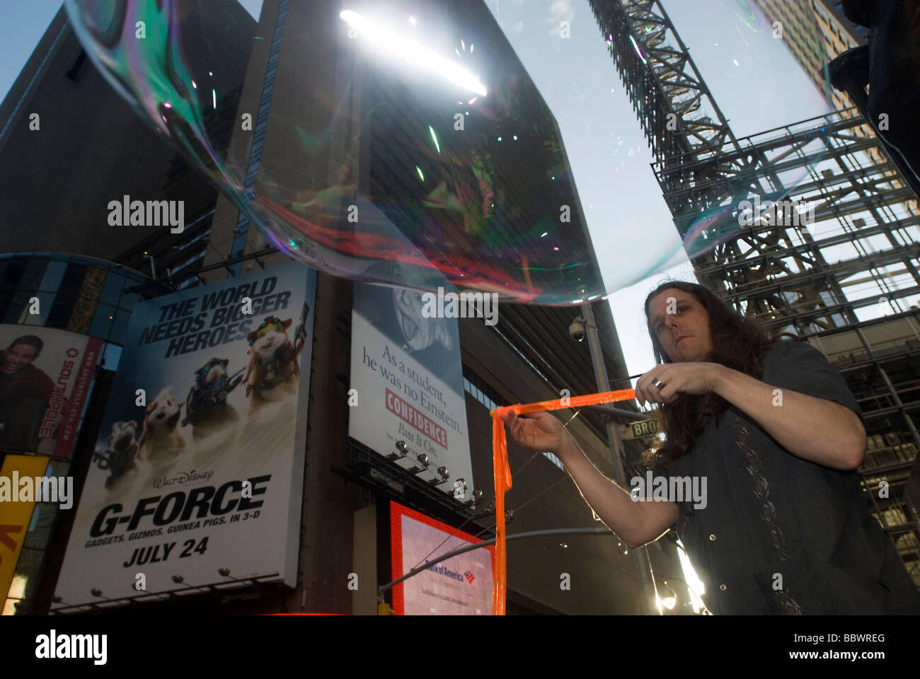 Hundreds of people gather in Times Square in New York to launch millions of bubbles Stock Photo