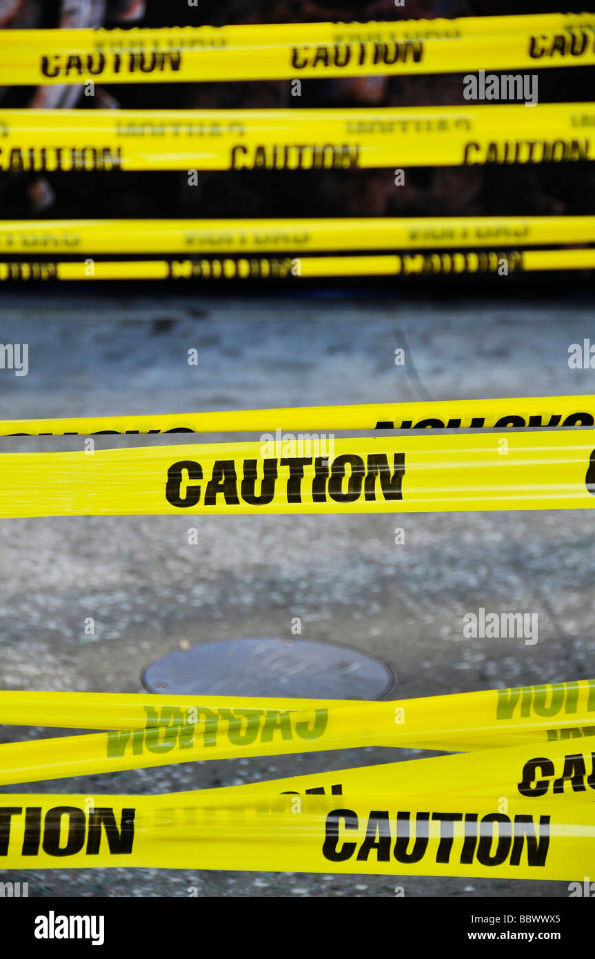 Caution tape to keep away the people from hazard Stock Photo