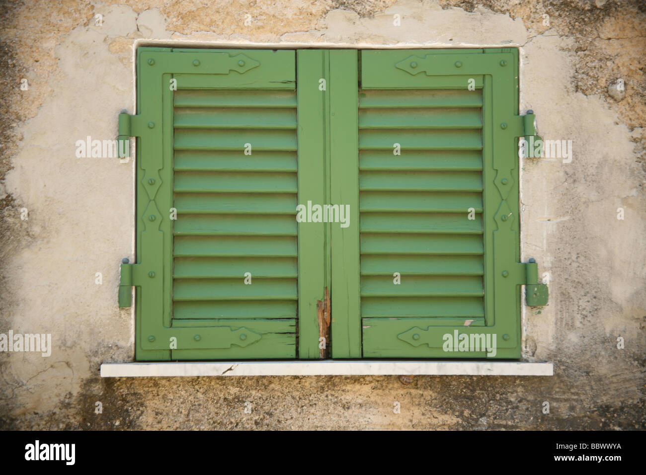 Closed rustic window shutters Cut Out Stock Images & Pictures - Alamy
