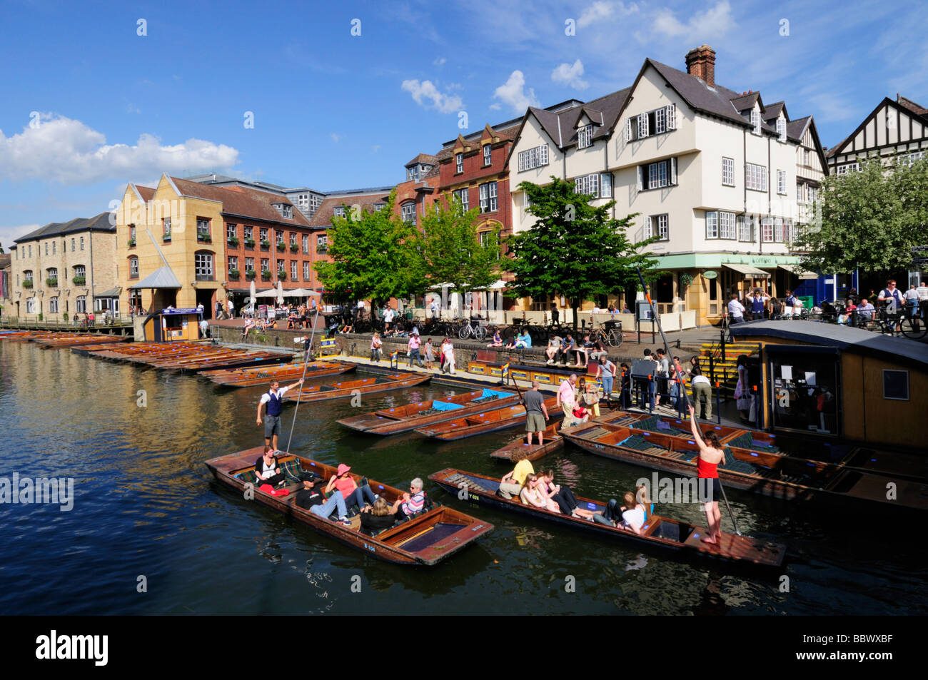 Punting on the River Cam at the Quayside and Magdalene Bridge area  of Cambridge England UK Stock Photo