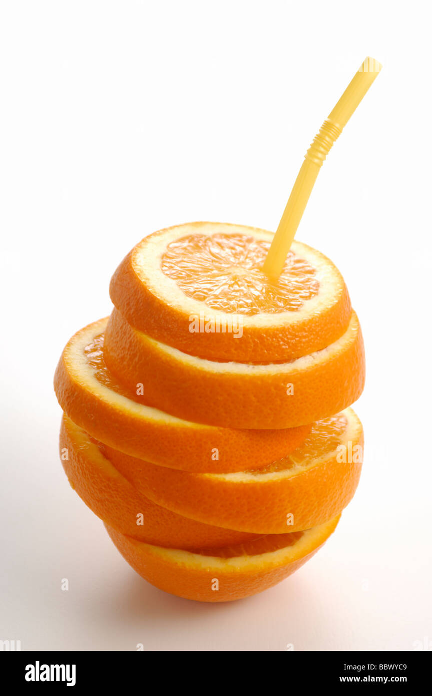 Sliced Orange with Straw Stock Photo