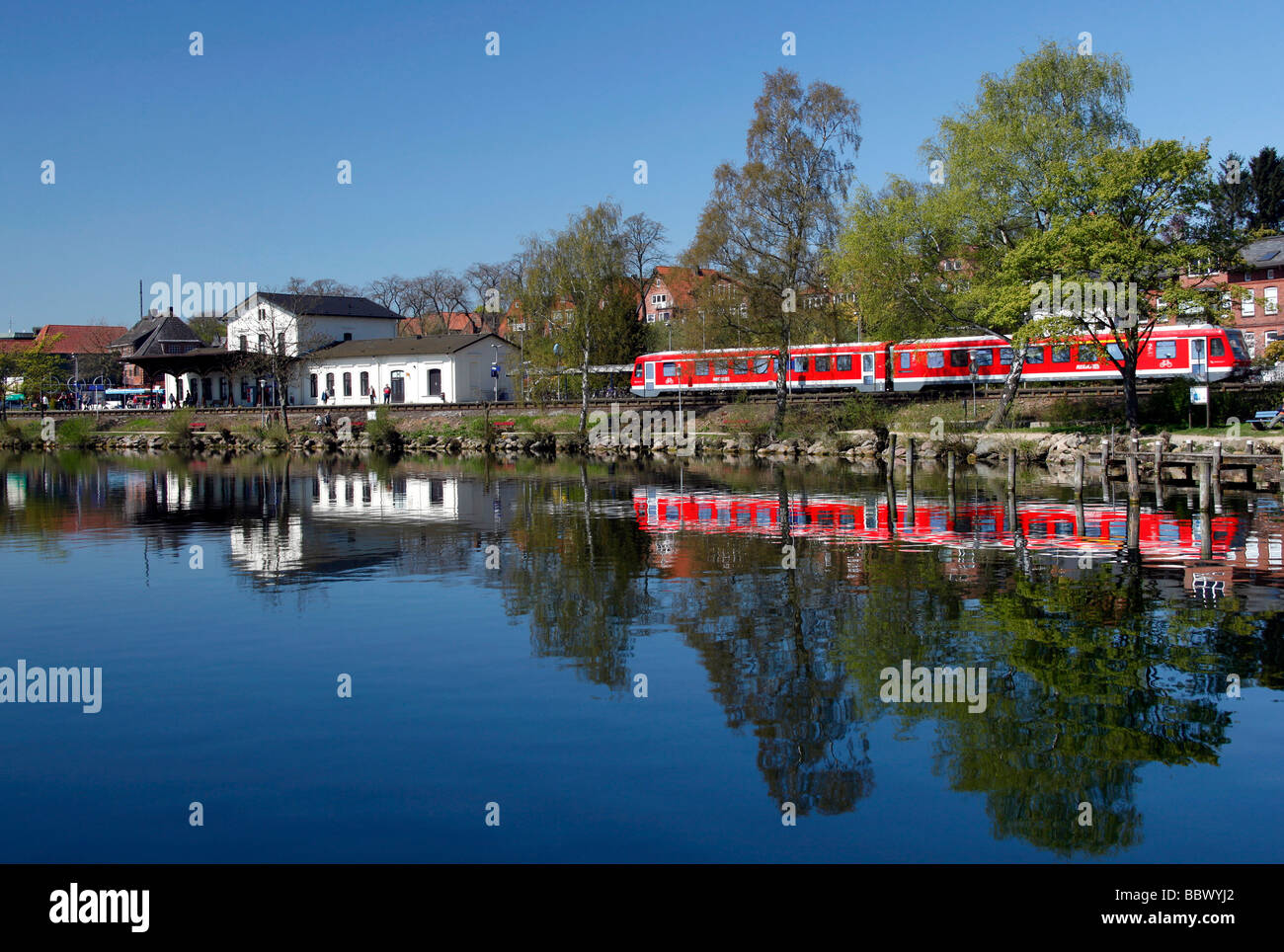 A regional train pulls into the main station on the shores of Lake Ploen, Ploen, Holstein Switzerland, Schleswig-Holstein, Germ Stock Photo